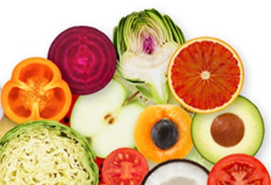 Frutas y verduras cortadas por la mitad. En la parte superior está el alcaucil. Frutas y verduras cortadas por la mitad. En la parte superior está el alcaucil.
