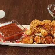 Coliflor al horno con salsa agridulce.