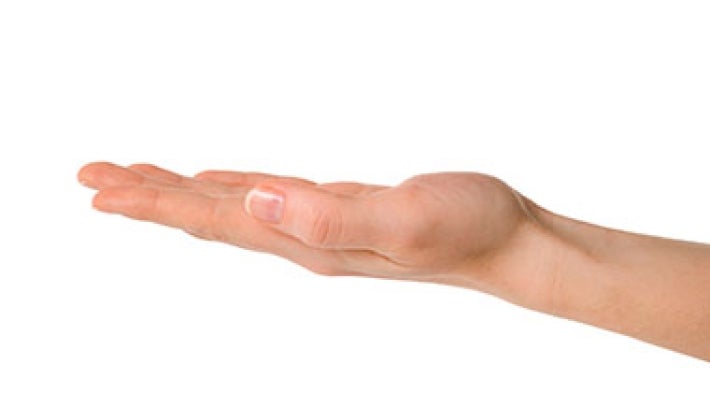 Mano ahuecada para calcular porciones de alimentos Mano ahuecada para calcular porciones de alimentos